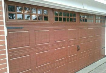 New Clopay wooden garage door installed in Blaine, MN home garage