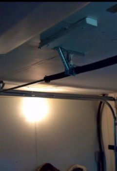 New extension spring installed on garage door in Champlin, MN