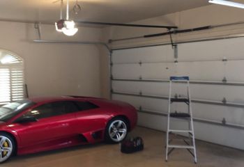 Car stuck inside garage due to malfunctioning garage door in New Hope, MN